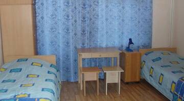 Фото номера Двухместный номер с 2 отдельными кроватями и общей ванной комнатой Гостиница в Старой Руссе г. Старая Русса 7